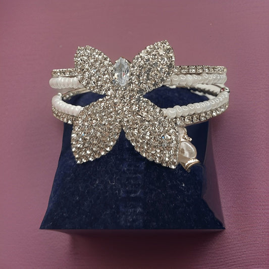 Channel your inner beauty with our Butterfly Bling Bracelet. Adorned with sparkling bling and featuring a delicate butterfly design, this bracelet adds a touch of glamour to any outfit. The lobster claw clasp ensures a secure fit, making it perfect for everyday wear.