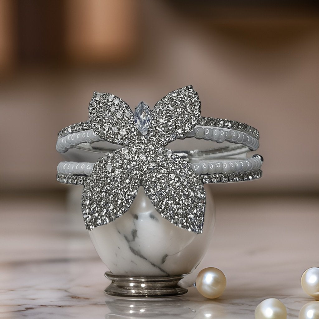 Channel your inner beauty with our Butterfly Bling Bracelet. Adorned with sparkling bling and featuring a delicate butterfly design, this bracelet adds a touch of glamour to any outfit. The lobster claw clasp ensures a secure fit, making it perfect for everyday wear.