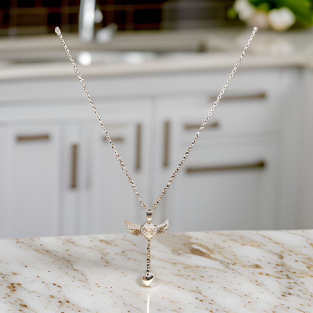 Add a whimsical touch to your ensemble with our Flappy Wing Pendant. This playful piece features a wing-shaped pendant that adds a sense of freedom to any outfit. The adjustable chain ensures a comfortable fit, making it suitable for all occasions.