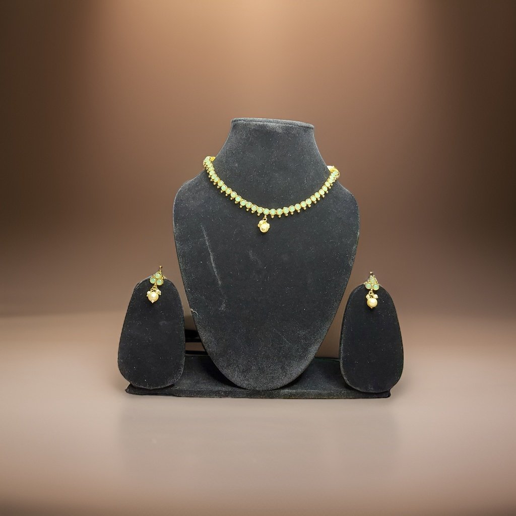 Elevate your look with our Kuhu Necklace. This stunning piece exudes sophistication with its timeless design and superior craftsmanship. Whether worn alone or layered with other necklaces, it adds a touch of glamour to any outfit.