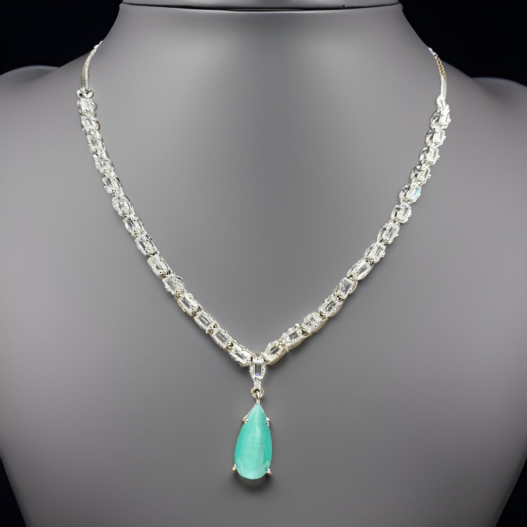 Make a style statement with our Mint Green Stylish Drop Necklace. Featuring a stylish drop design with mint green accents, this necklace adds a pop of color to any ensemble. The adjustable length ensures a comfortable fit, making it suitable for all occasions.