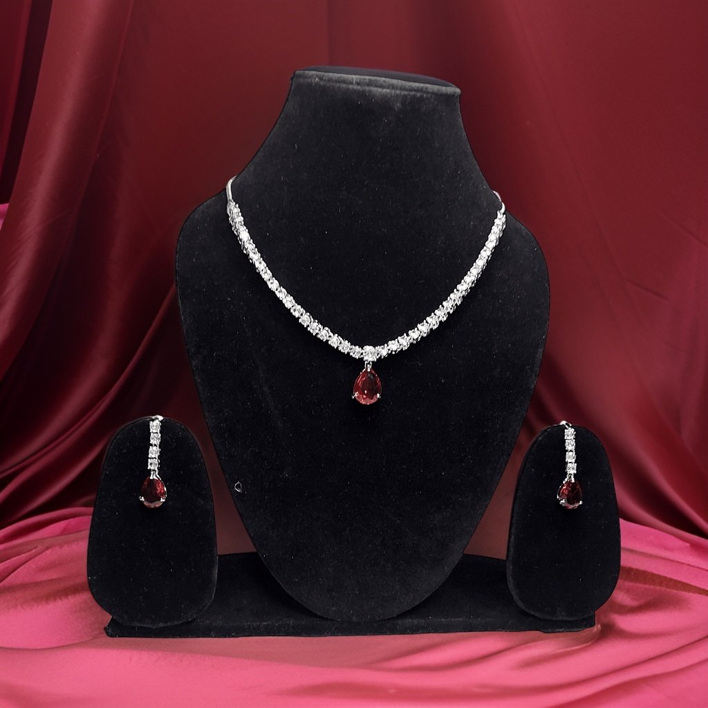 Add a bold pop of color to your ensemble with our Mint Red Stylish Drop Necklace. This statement piece features a stylish drop design with vibrant red accents. The adjustable length ensures a comfortable fit, making it suitable for all occasions.