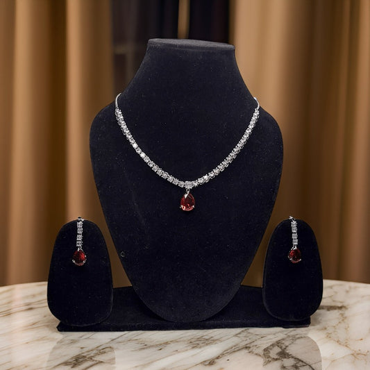 Add a bold pop of color to your ensemble with our Mint Red Stylish Drop Necklace. This statement piece features a stylish drop design with vibrant red accents. The adjustable length ensures a comfortable fit, making it suitable for all occasions.