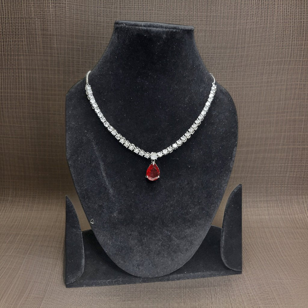 Add a bold pop of color to your ensemble with our Mint Red Stylish Drop Necklace. This statement piece features a stylish drop design with vibrant red accents. The adjustable length ensures a comfortable fit, making it suitable for all occasions.