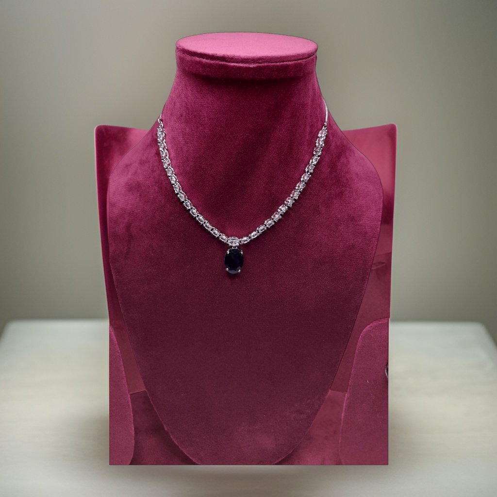 Make a bold statement with our Olivia Sapphire Blue American Diamond Necklace. This eye-catching piece features sparkling sapphire blue American diamond accents that catch the light beautifully. The adjustable chain ensures a perfect fit, making it suitable for all necklines.