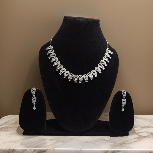 Elevate your look with our Premium American Diamond Necklace. This luxurious piece features high-quality American diamond accents that add instant glamour to any ensemble. The adjustable chain ensures a perfect fit, making it suitable for all necklines.