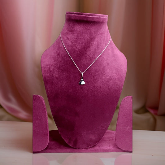 Make a statement with our Pyramid Sterling Pendant. This bold piece features a pyramid-shaped pendant crafted from sterling silver, adding a touch of edgy elegance to any look. The adjustable chain ensures a comfortable fit, making it suitable for all occasions.