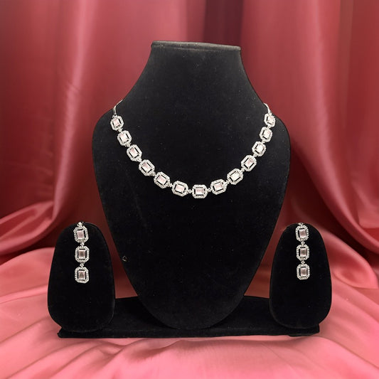 Add a touch of sparkle to your neckline with our Round Cluster American Diamond Necklace. This elegant piece features a cluster of sparkling American diamond accents that catch the light beautifully. The adjustable chain ensures a perfect fit, making it suitable for all necklines.
